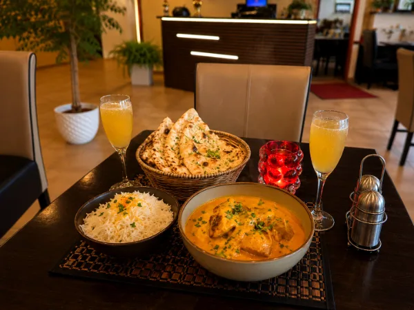 Butter Chicken mit Reis und Naan bei Indus Valley Aalen